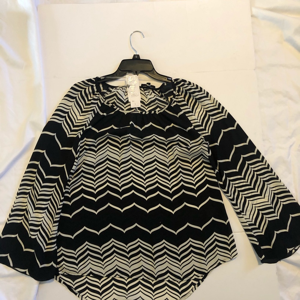 Black and beige shirt size small